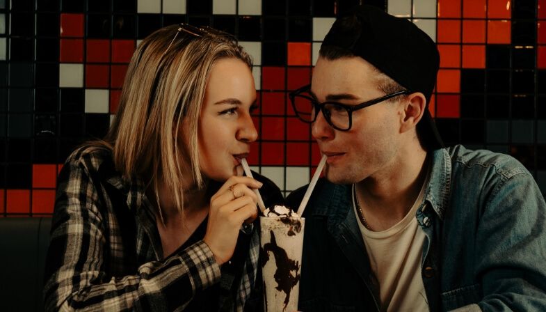 Happy couple at a RocoMamas restaurant table